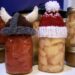 canning jars wearing knitted hats.